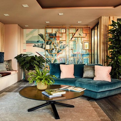 Mid-sized eclectic open concept dark wood floor and brown floor family room photo in Munich with beige walls, no fireplace and no tv