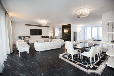 Großes Klassisches Wohnzimmer im Loft-Stil mit grauer Wandfarbe, Marmorboden, Tunnelkamin, verputzter Kaminumrandung, TV-Wand und schwarzem Boden in Düsseldorf