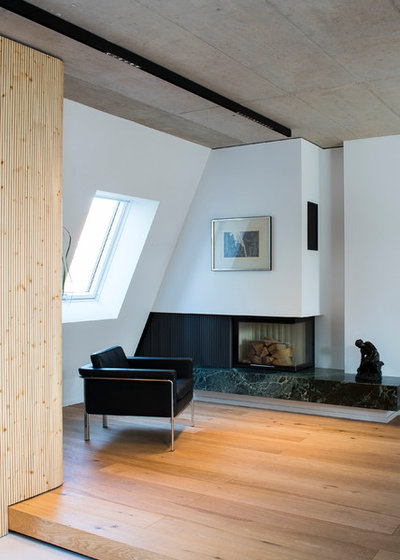 Minimalistisch Wohnzimmer by Bachmann Badie Architekten