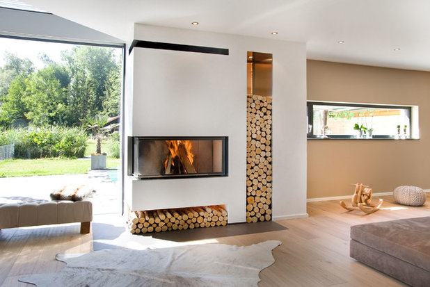 Modern Wohnzimmer by Ofenbau Madl GmbH
