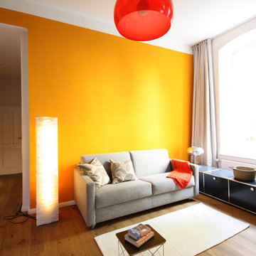 living room with orange wall