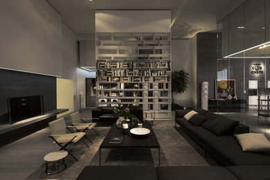 Geräumiges, Repräsentatives, Fernseherloses, Offenes Modernes Wohnzimmer mit grauer Wandfarbe und dunklem Holzboden in Köln