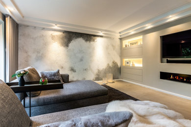 Modernes Wohnzimmer mit grauer Wandfarbe und TV-Wand in Dortmund