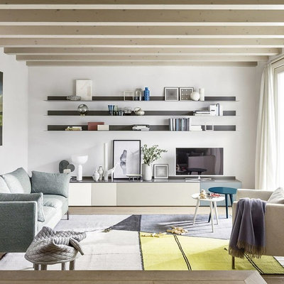 Inspiration for a mid-sized scandinavian enclosed light wood floor and beige floor family room remodel in Berlin with white walls, no fireplace and a tv stand