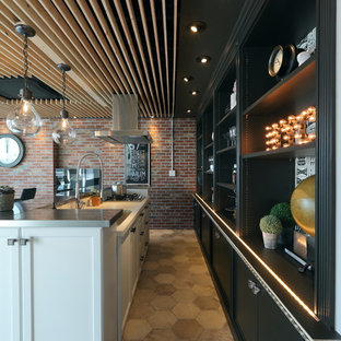 Photo of an industrial single-wall eat-in kitchen in Nagoya with an undermount sink, white cabinets, solid surface benchtops, terra-cotta floors and multi-coloured floor.