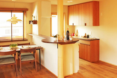 Example of a zen kitchen design in Other