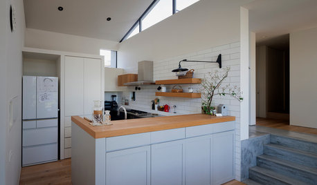 Houzz Tour: A Hillside Family Home with Timber and Concrete Details