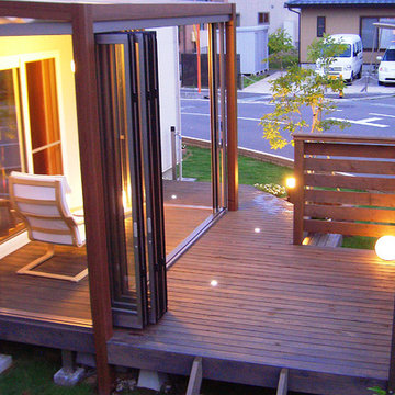 ガーデンルームで過ごす夜の庭 アロウズガーデンデザイン 長野県S様邸