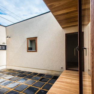 Example of an urban patio design in Other