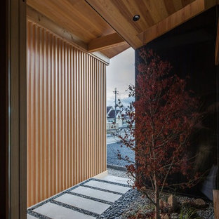 Foto di un patio o portico etnico di medie dimensioni e davanti casa