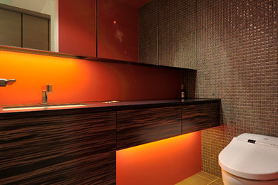 Inspiration for a modern powder room remodel in Tokyo