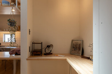 Example of a danish home office design in Other