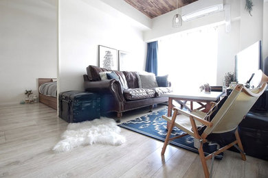 Inspiration for a scandi living room in Tokyo with white walls, painted wood flooring and grey floors.