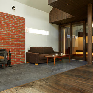 75+ Wohnzimmer mit oranger Wandfarbe und schwarzem Boden Ideen & Bilder