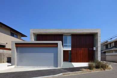 Свежая идея для дизайна: серый дом в стиле модернизм с плоской крышей - отличное фото интерьера