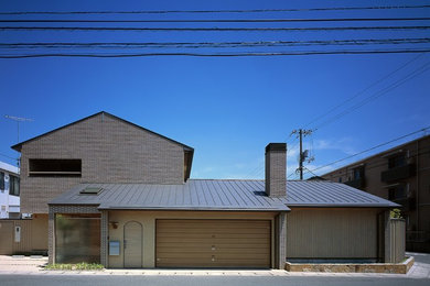 他の地域にあるコンテンポラリースタイルのおしゃれな家の外観の写真