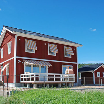 スウェーデンの郊外に点在する家々を連想するお家