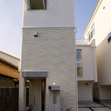 モザイクタイル・天然木羽目板の狭小住宅、東京