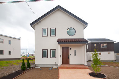 札幌にあるアジアンスタイルのおしゃれな家の外観の写真