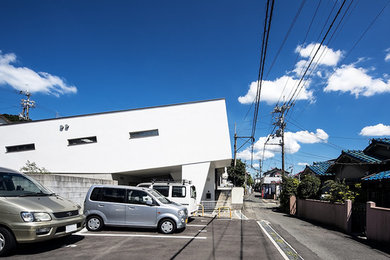 Photo of a contemporary two floor house exterior in Osaka.