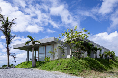 他の地域にあるアジアンスタイルのおしゃれな家の外観の写真