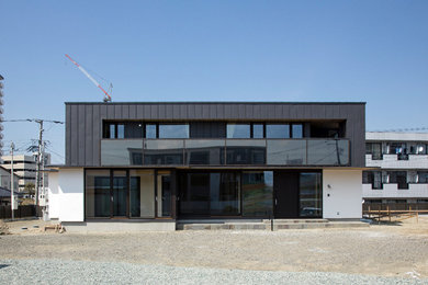 Foto de fachada de casa moderna de dos plantas
