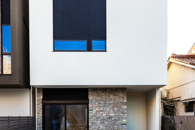 Diseño de fachada de casa blanca minimalista