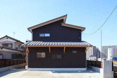 Idées déco pour une façade de maison craftsman avec un toit en appentis.