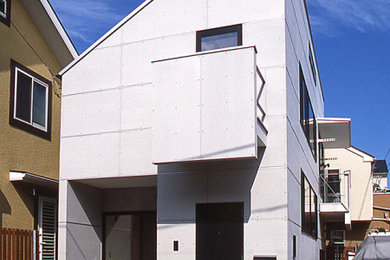 東京23区にあるインダストリアルスタイルのおしゃれな家の外観 (コンクリート繊維板サイディング) の写真