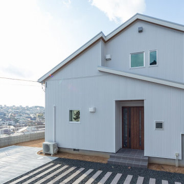 神戸市北区の大パノラマリビングの平屋風2階建ての家