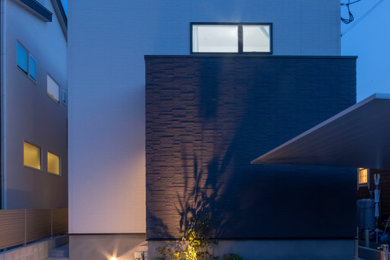 Design ideas for a modern house exterior in Fukuoka.