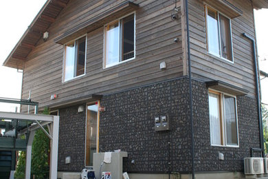 札幌にあるカントリー風のおしゃれな家の外観の写真