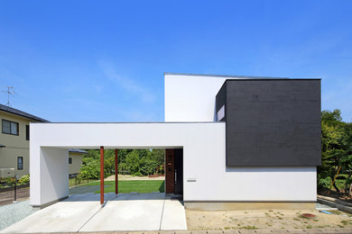 Ejemplo de fachada de casa blanca moderna con tejado de un solo tendido y tejado de metal