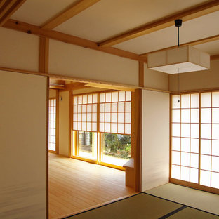 Foto de dormitorio de estilo zen, grande, con tatami y suelo verde