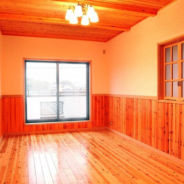 木材と漆喰塗り仕上げとした寝室