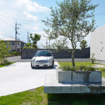 家族が集える庭があり、ガレージを再考した外構植栽ランドスケープデザイン