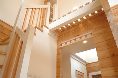 Foto de escalera en L escandinava con escalones de madera y contrahuellas de madera