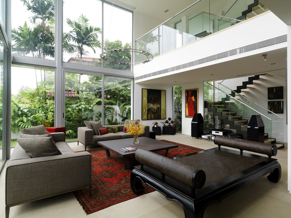 Inspiration for a large contemporary living room in Singapore with white walls.