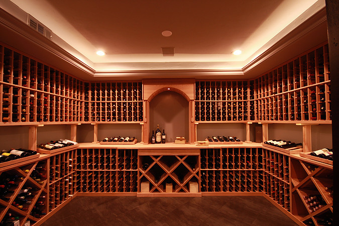 Inspiration for a rustic wine cellar remodel in Denver with storage racks