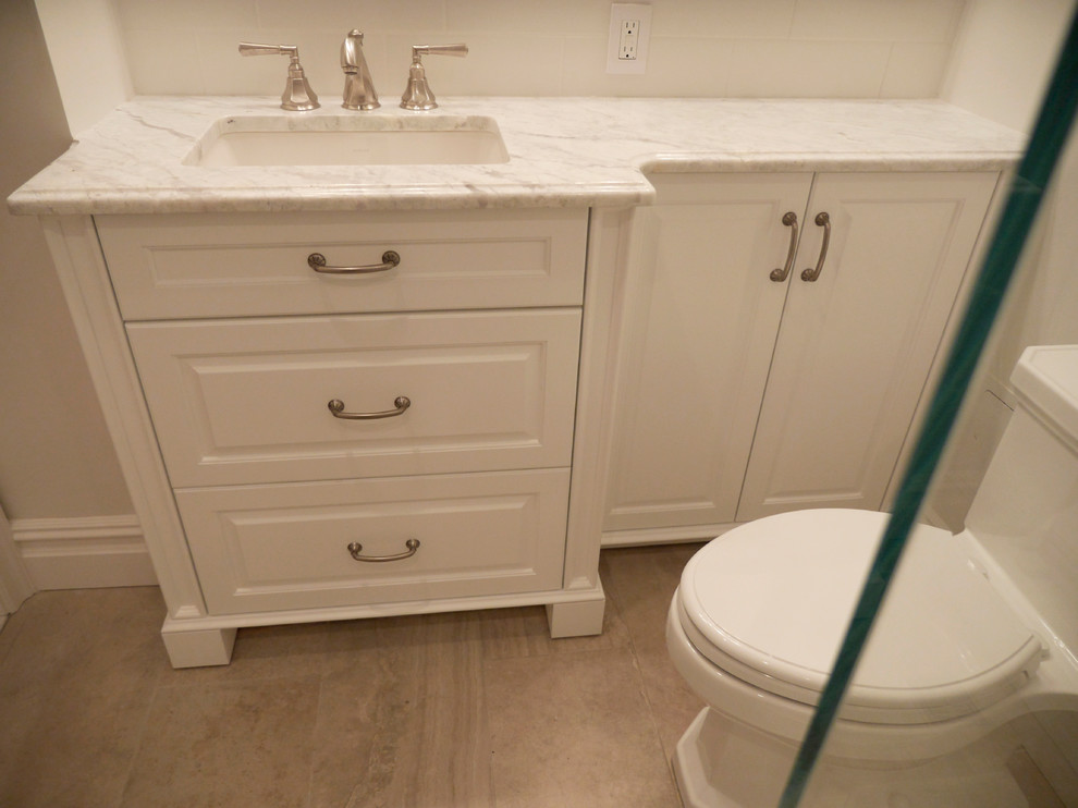 This is an example of a small traditional master bathroom in New York.