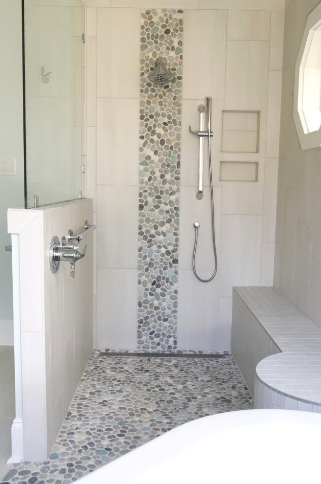 Large transitional master beige tile and pebble tile ceramic tile and beige floor freestanding bathtub photo with recessed-panel cabinets, gray cabinets, green walls, an undermount sink, limestone countertops and multicolored countertops