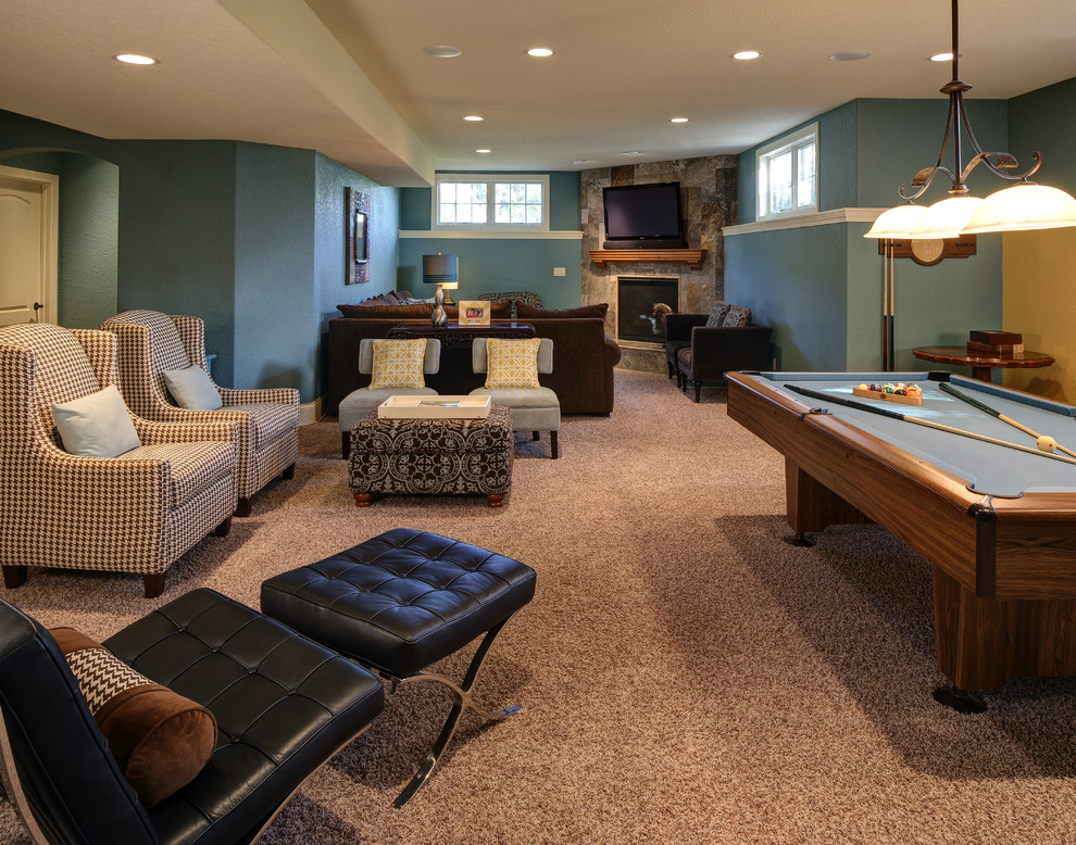 Photo of a large traditional enclosed family room in Milwaukee with blue walls, carpet, a corner fireplace, a tile fireplace surround and a wall-mounted tv.