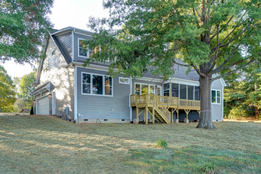 Example of a transitional home design design in Charlotte