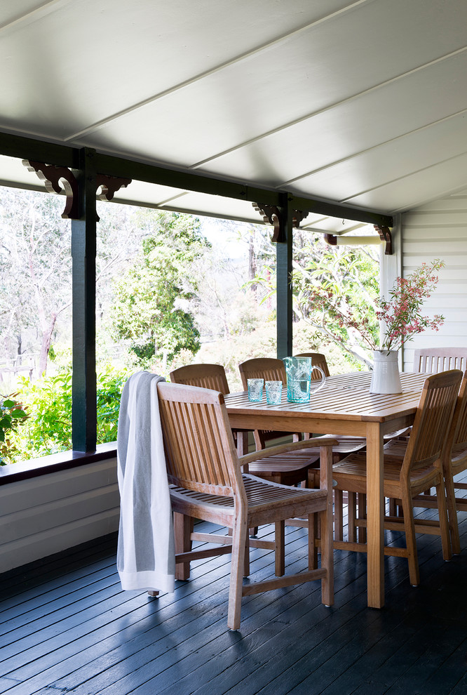 Inspiration for a country verandah in Brisbane with decking and a roof extension.
