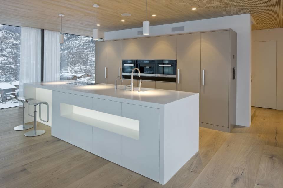This is an example of a contemporary kitchen in Nuremberg with solid surface benchtops.