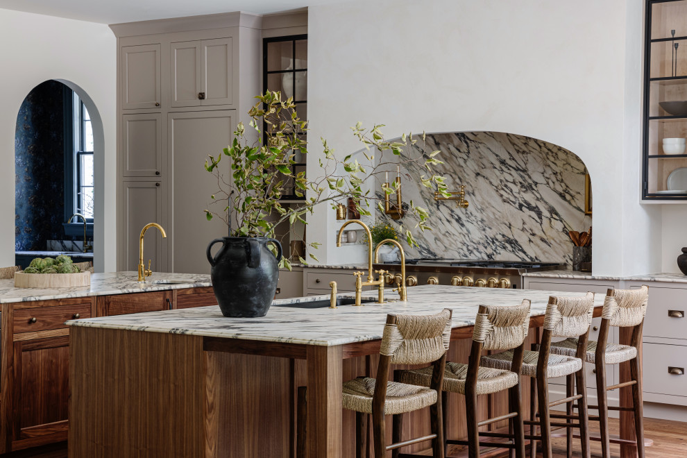 Inspiration for a transitional dark wood floor and brown floor kitchen remodel in Charlotte with an undermount sink, flat-panel cabinets, gray cabinets, multicolored backsplash, stone slab backsplash, stainless steel appliances, two islands and multicolored countertops