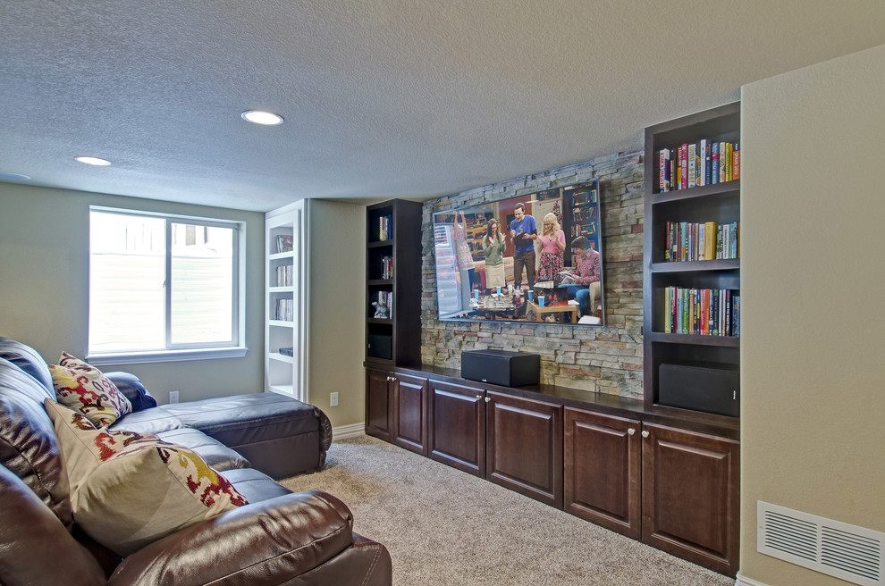 Design ideas for a large traditional look-out basement in Denver with beige walls, carpet, no fireplace and beige floor.