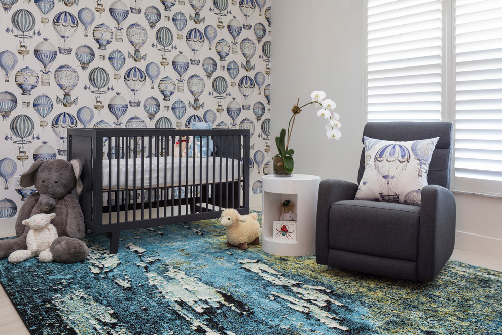 This is an example of a transitional nursery for boys in Orlando with multi-coloured walls.