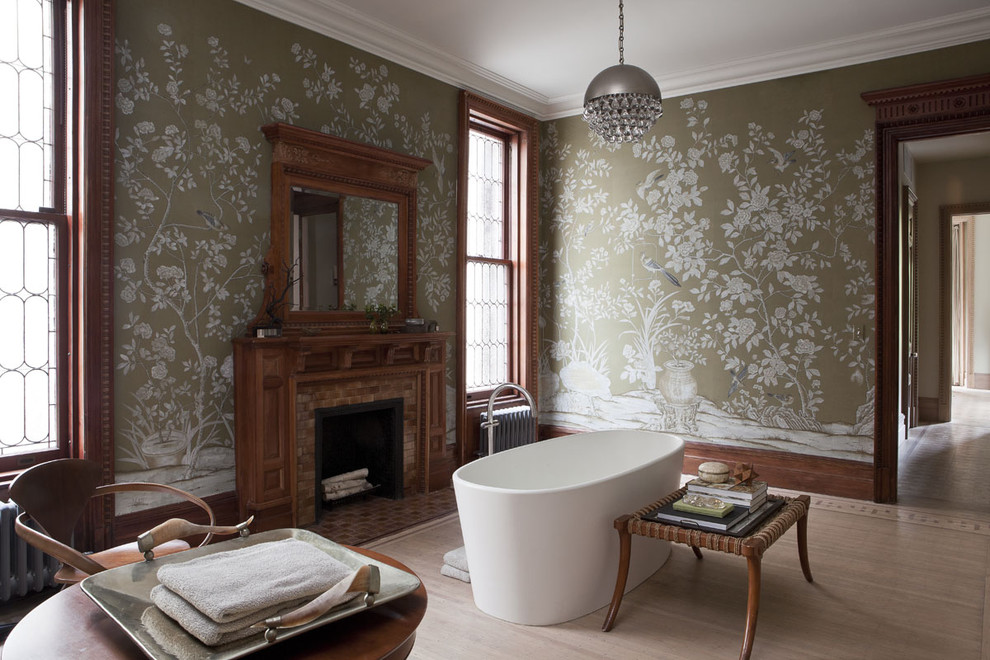 Inspiration for a traditional bathroom in New York with a freestanding tub and multi-coloured walls.