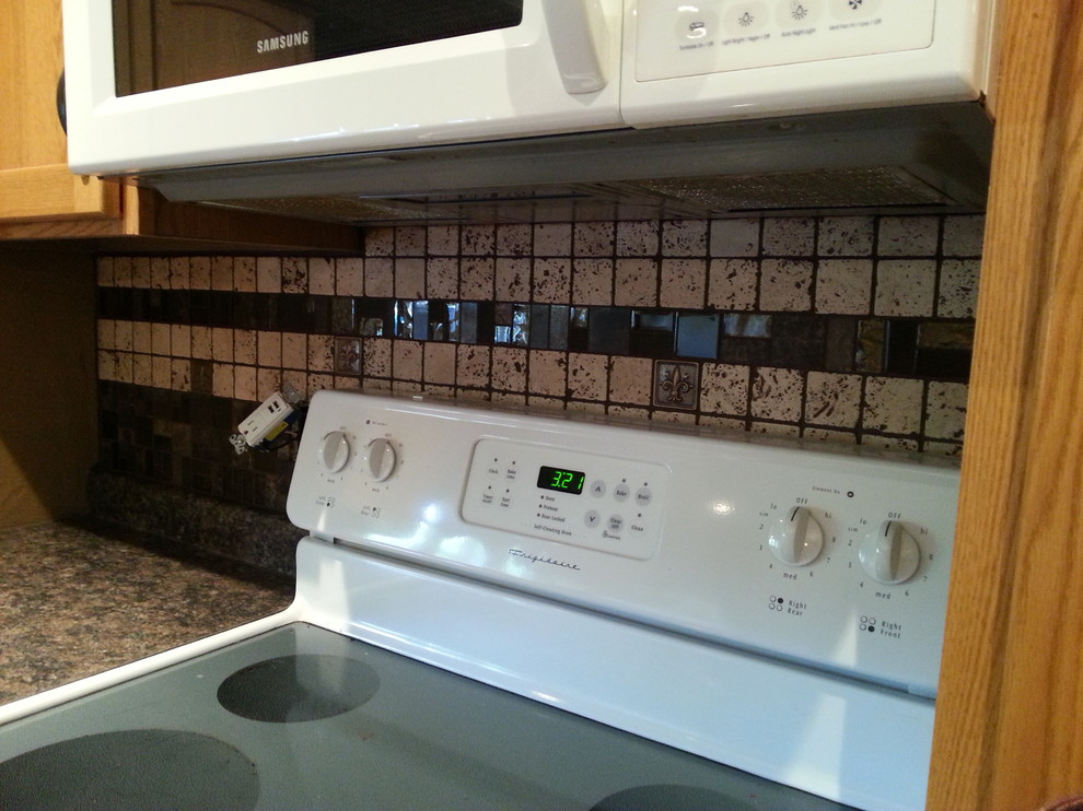 Inspiration for a rustic kitchen remodel with mosaic tile backsplash